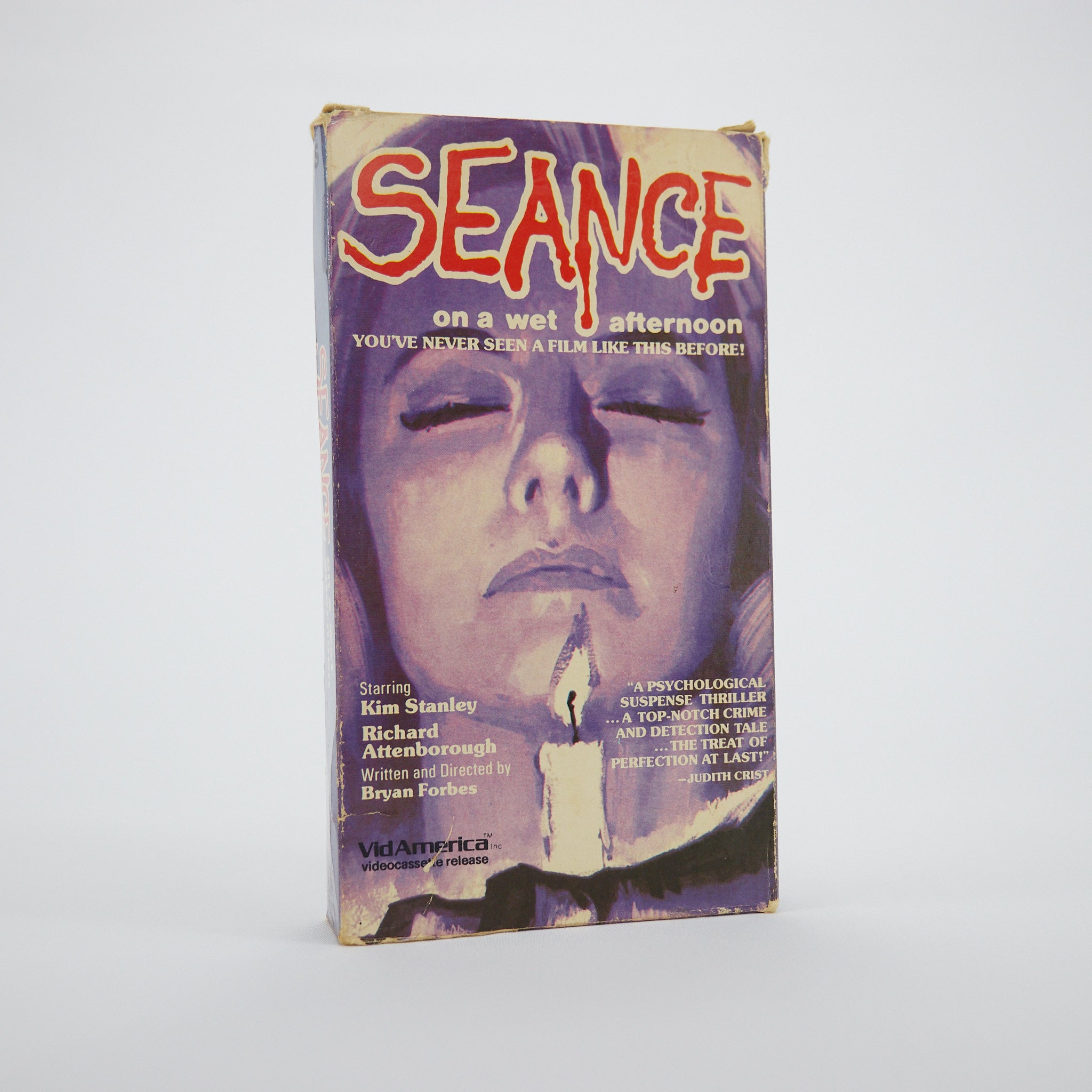 Vintage VHS cover of 'Seance on a Wet Afternoon' with a purple and red design.