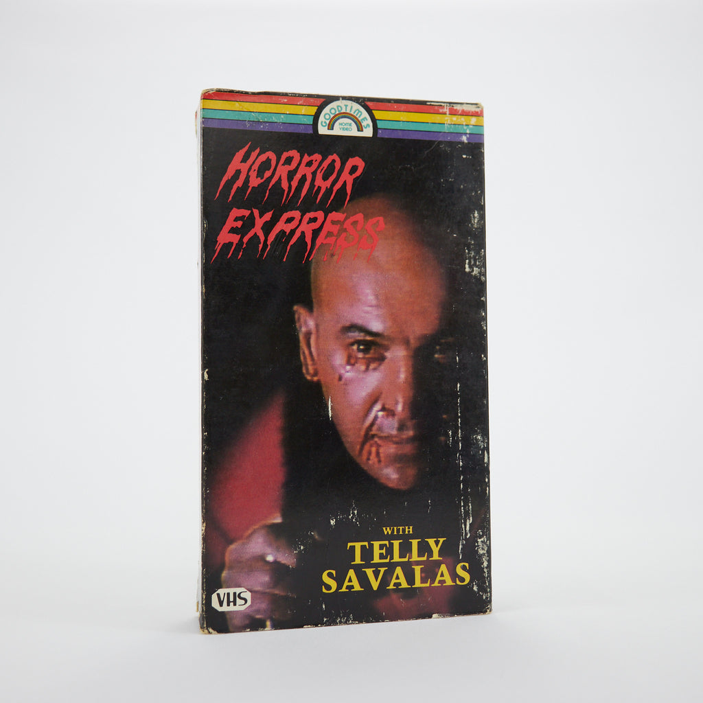 VHS tape cover of 'Horror Express' featuring Telly Savalas on a white background