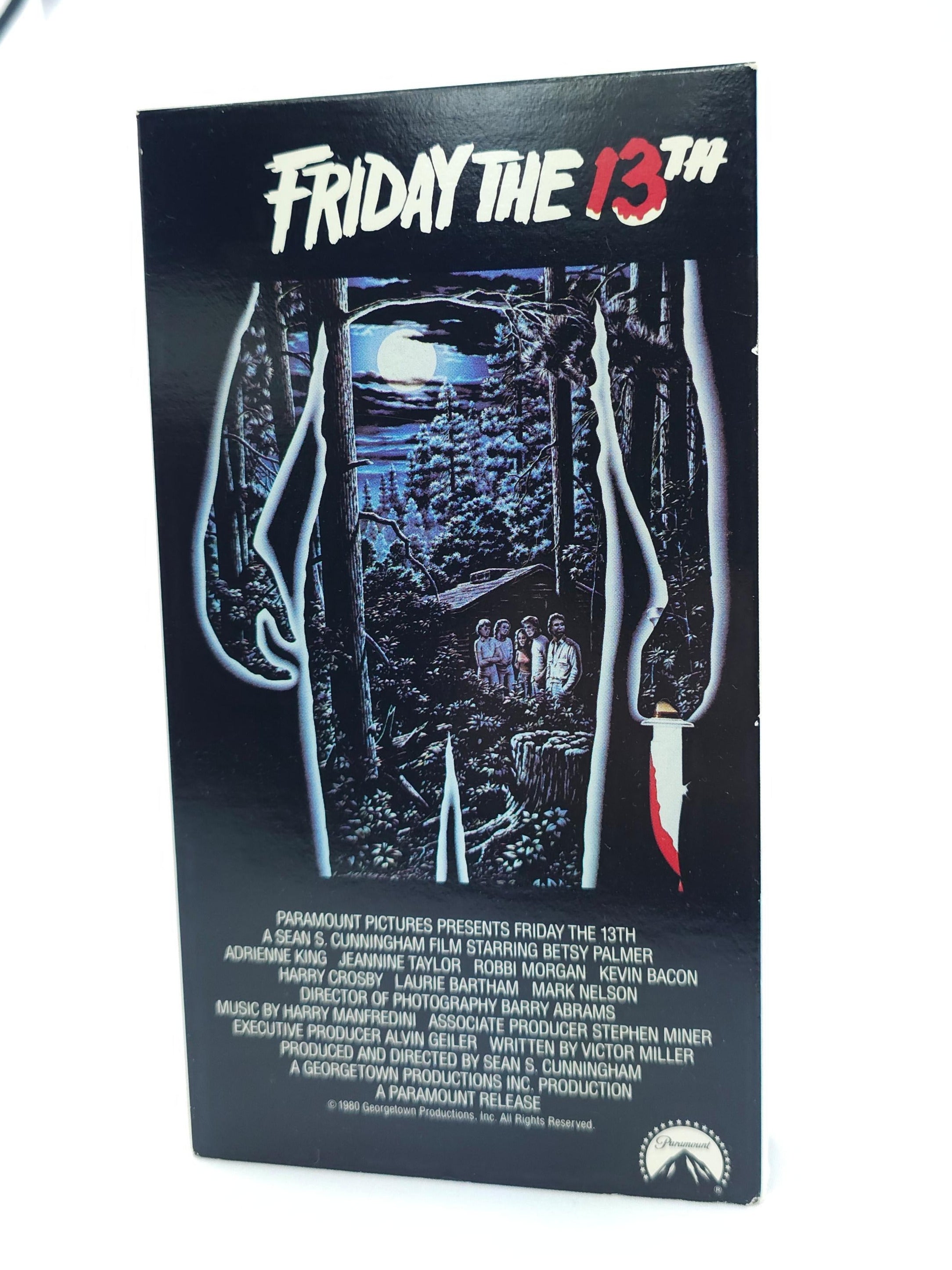 DVD cover of 'Friday the 13th' with a knife and hands design on a white background